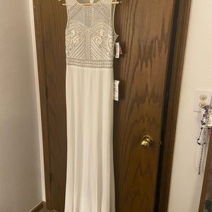 White evening gown with rhinestone front. RM Richards. Size 11.